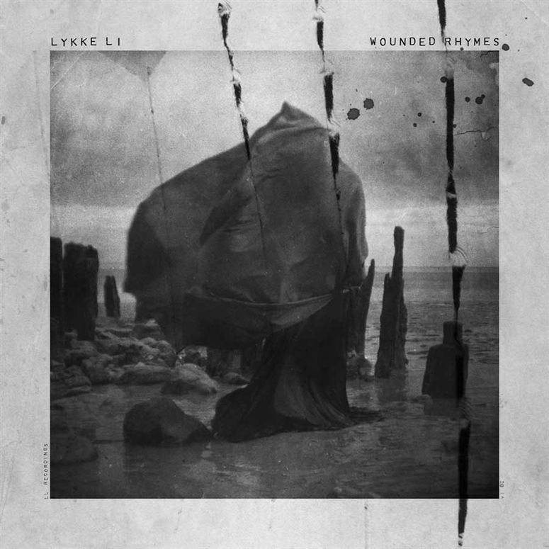 Second album: Wounded Rhymes